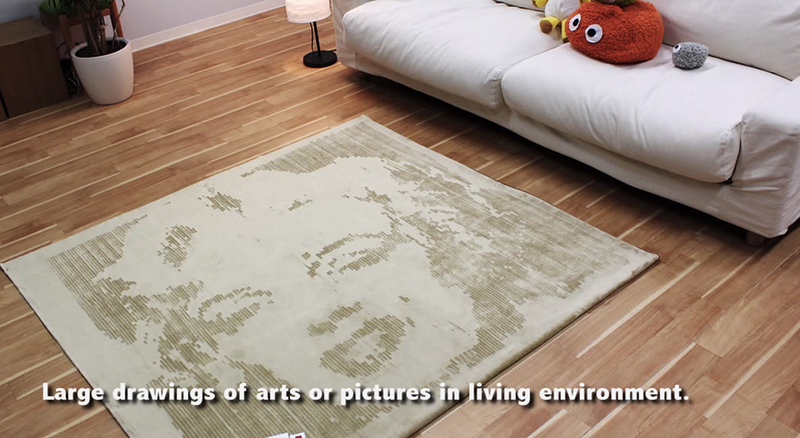 Illustration for article titled This Clever Carpet "Printer" Brushes Pictures Onto Your Rugs